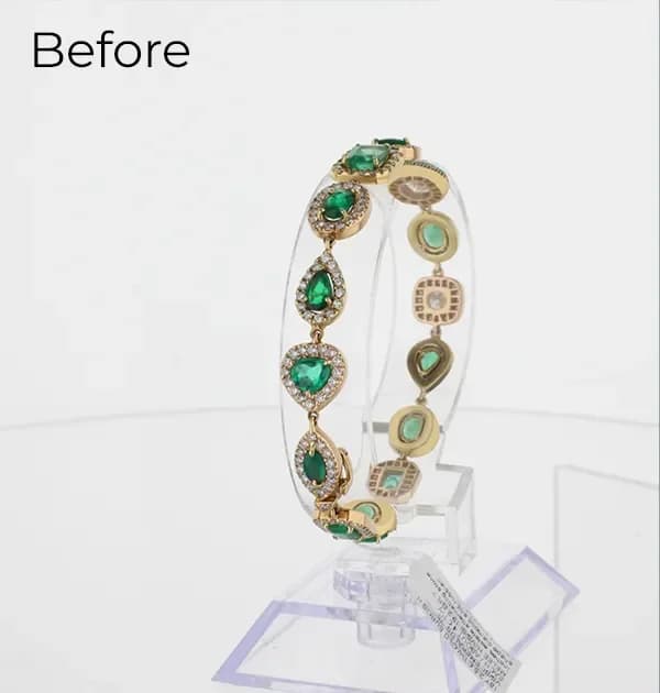 Bracelet on cluttered surface before AI retouching